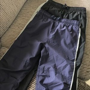 Two kids active pants, selling both, blue/black